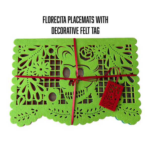 Florecita placemats with decorative felt tag, wrapped in red ribbon